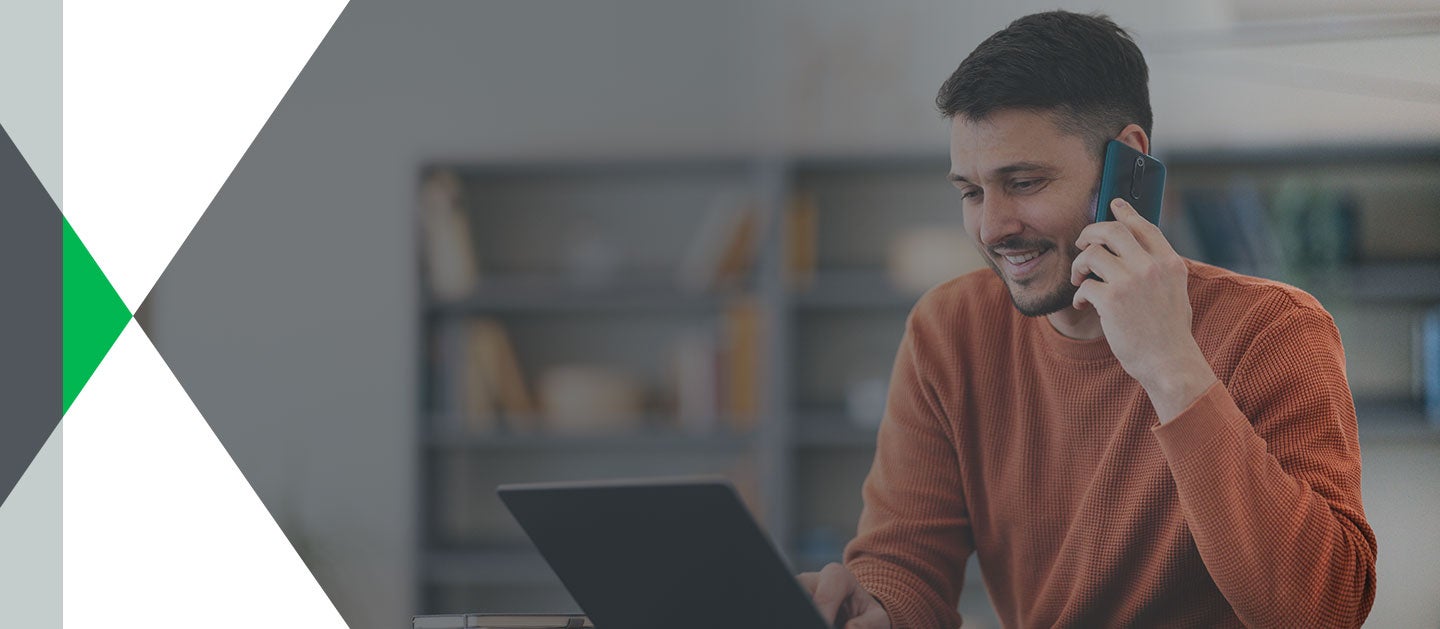 man smiling on phone call