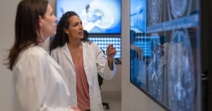 radiologists reviewing scans